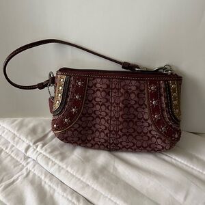 Coach signature Plum mini purse like New
